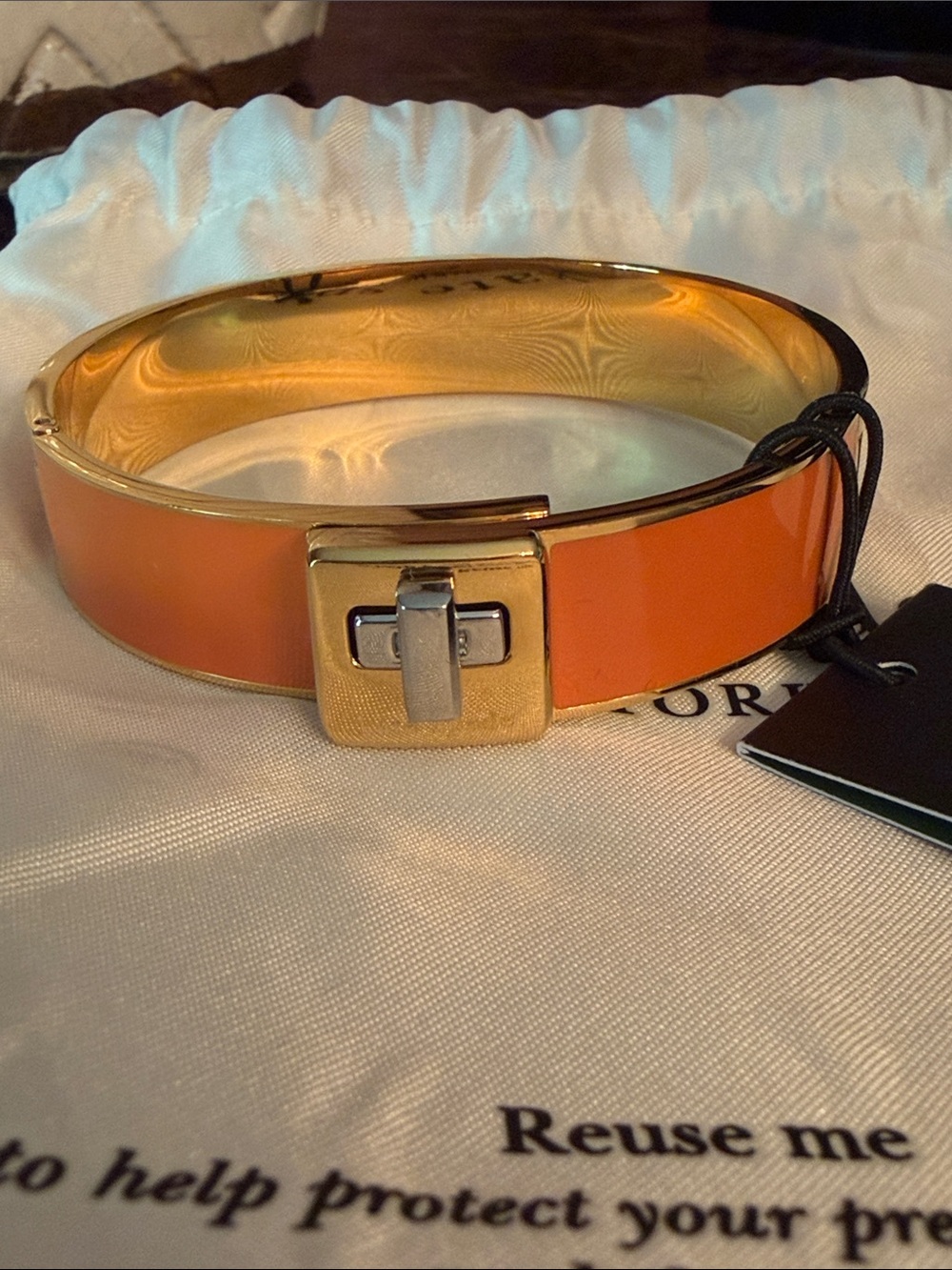 kate spade  NWT Gold-Tone Orange Enamel Hinged Bangle Bracelet.  With Dust Bag